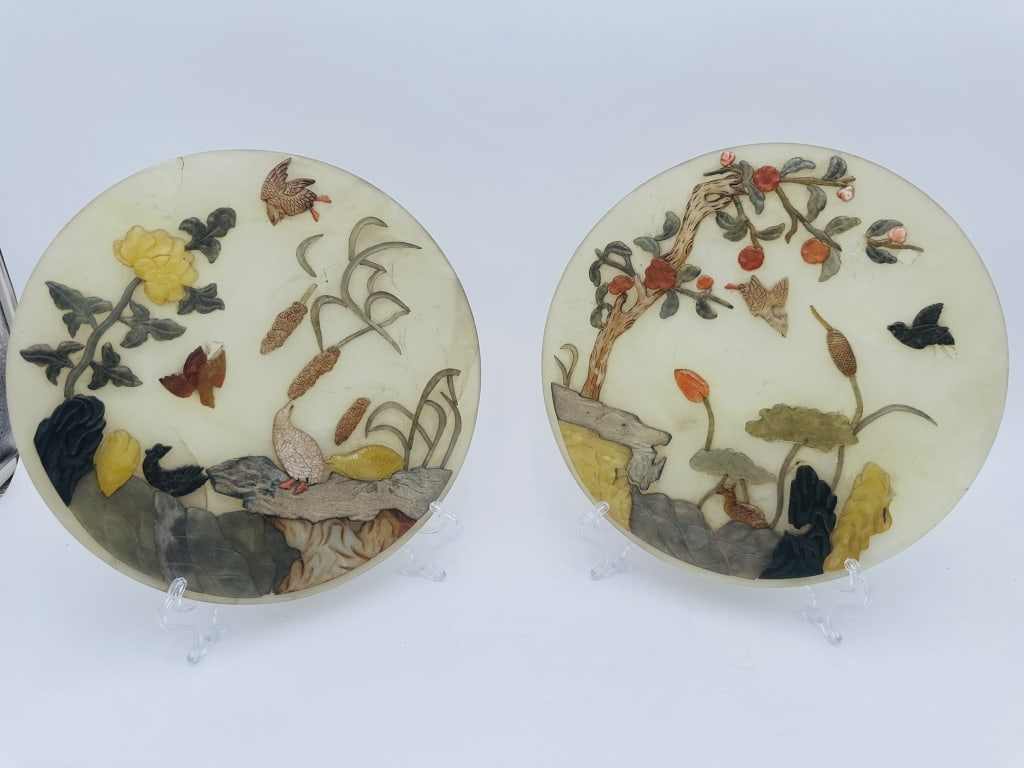 Pair of Chinese Hardstone-Inlaid Jade Plaques with Birds and Flowers An exquisite pair of circular: Pair of Chinese Hardstone-Inlaid Jade Plaques with Birds and Flowers An exquisite pair of circular Chinese plaques, finely crafted from pale jade or