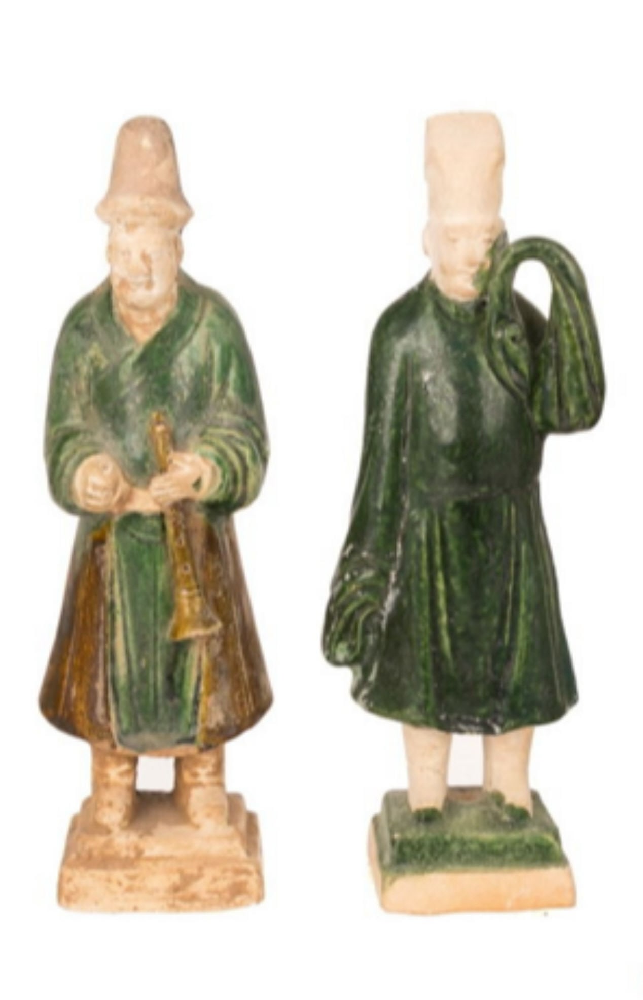 A PAIR Chinese Ming Dynasty sancai-glazed pottery tomb figures, 16th?17th century. The figures (1 of 3)