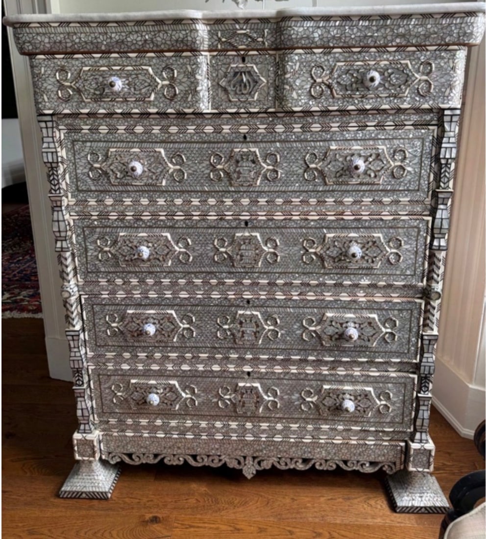 An Impressive Syrian Mother-of-Pearl Inlaid Bureau: An Impressive Syrian Mother-of-Pearl Inlaid BureauAntique early-20th Century Middle-Eastern mother of pearl decorates the front of this beautiful five drawer chest. The handles are carved from camel b