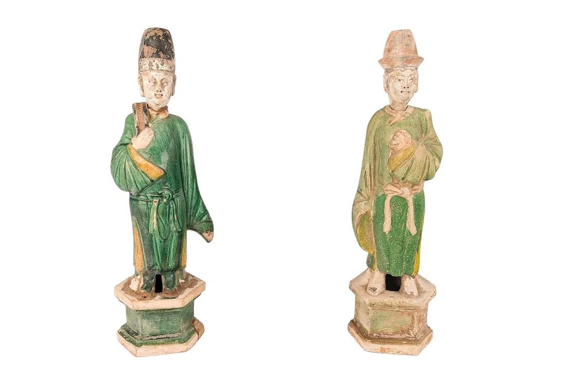 A PAIR Chinese Ming Dynasty sancai-glazed pottery tomb figures, 16th?17th century. The figures (1 of 4)