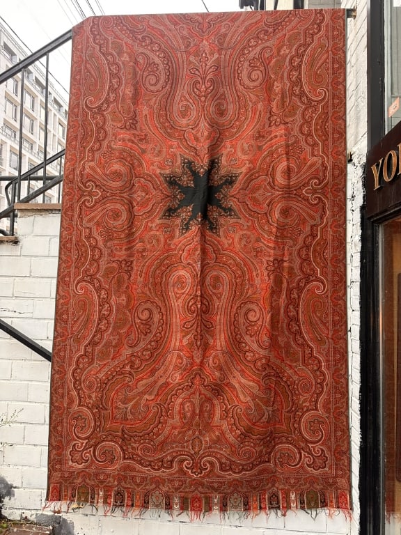 Antique Kashmiri Wool Paisley Shawl, 19th CenturyA fine handwoven Kashmiri wool pashmina shawl: Antique Kashmiri Wool Paisley Shawl, 19th CenturyA fine handwoven Kashmiri wool pashmina shawl featuring an intricate all-over boteh (paisley) and floral design in rich shades of red, coral, and ochre