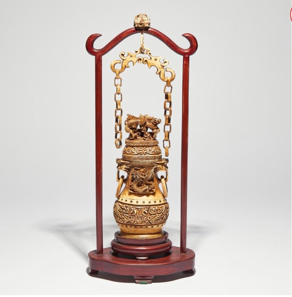 An Ivory Carved Hanging Vase and Cover Carved in an archaistic vessel form with dragons in relief (1 of 6)