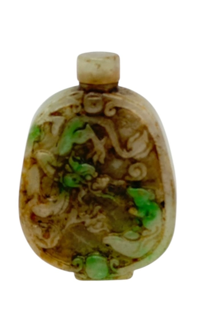 Chinese Carved Jade Snuff Bottle with Dragon DecorationCarved jade snuff bottle of flattened oval (1 of 3)