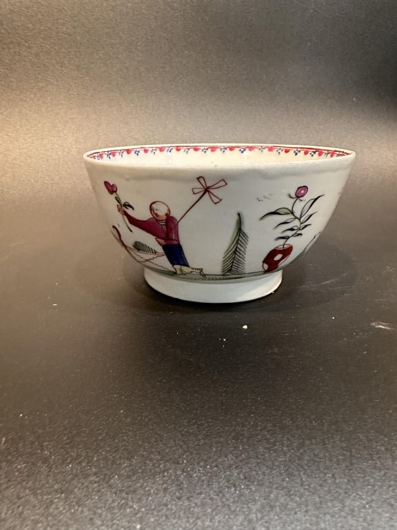 A finely hand-painted Chinese porcelain bowl decorated in famille rose enamels, depicting figures (1 of 6)