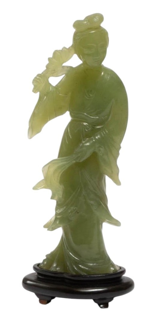 Chinese Green Hardstone Carved Figure of a Lady od A Chinese carved green hardstone figure depicting (1 of 2)