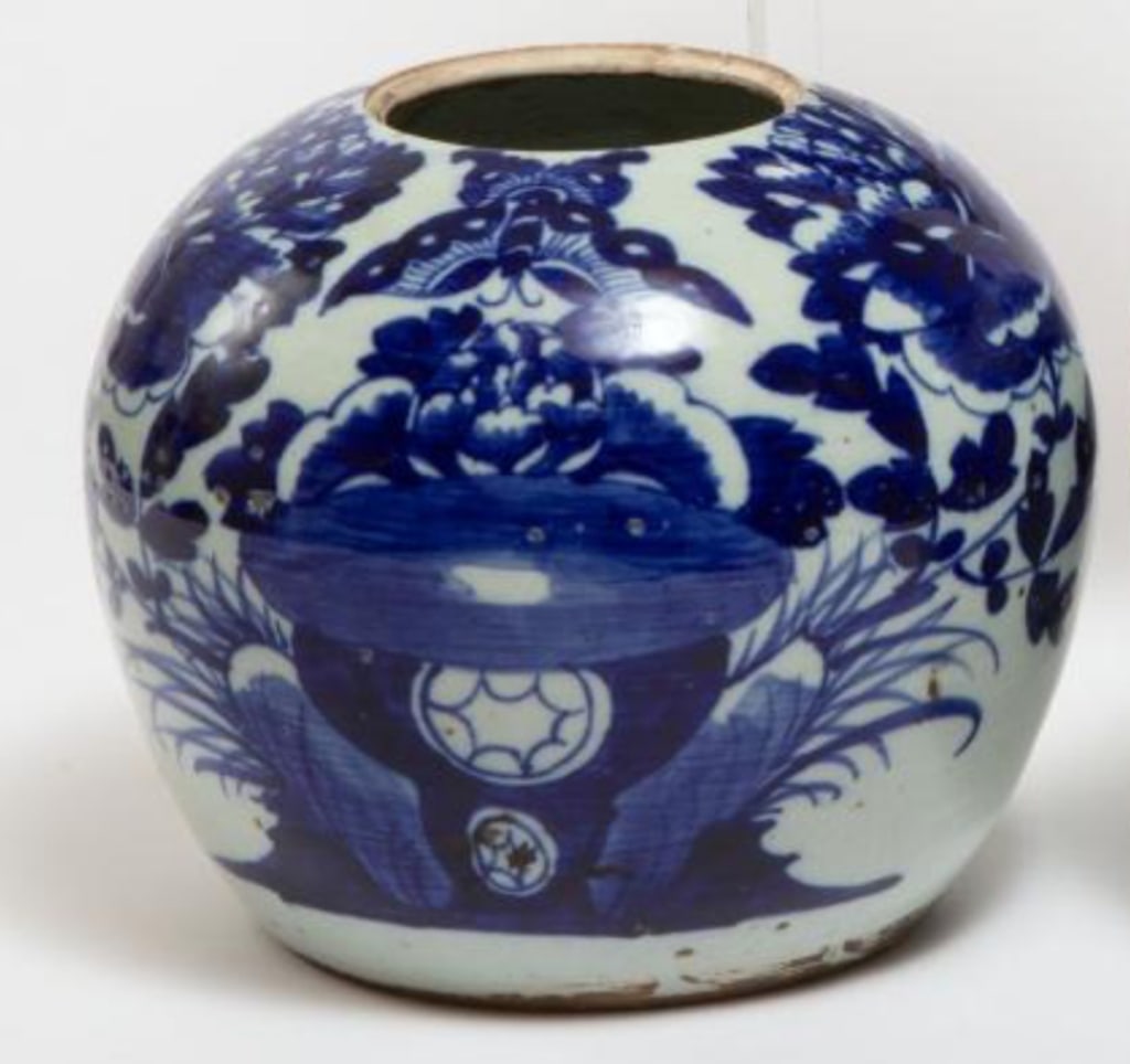 Chinese Blue and White Porcelain Jar with Floral h A globular blue and white porcelain jar,: A globular blue and white porcelain jar, decorated in deep cobalt underglaze with large-scale floral blooms and foliage, interspersed with auspicious precious objects, including a censer, scrolls, and