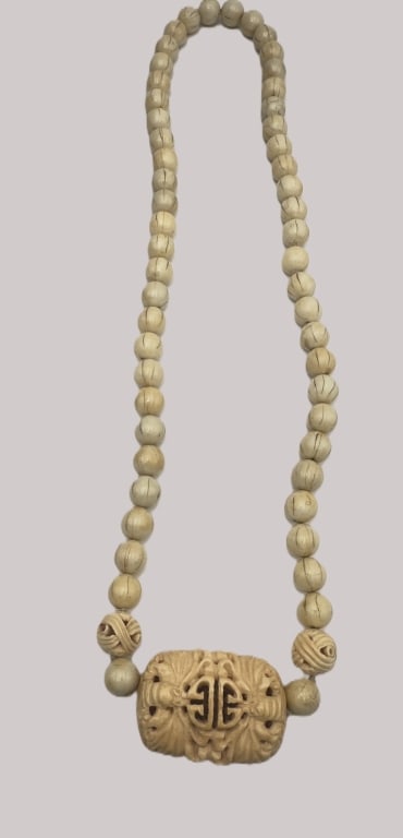 Carved Bone Sculpture Figure A finely carved bone figure, executed with careful attention to detail (1 of 5)