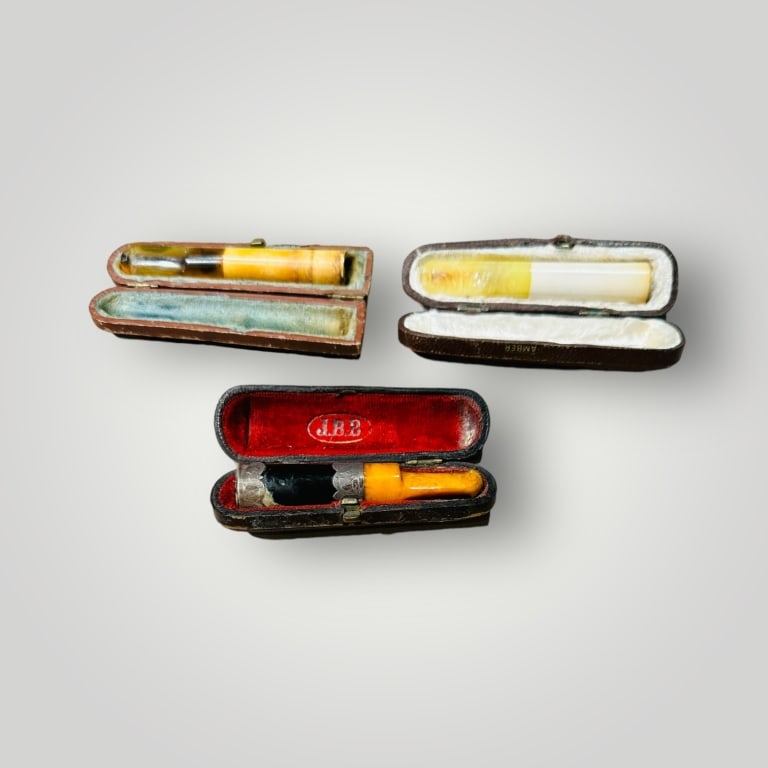 three Amber butterscotch holder with silver three Amber butterscotch holder with silver with (1 of 2)