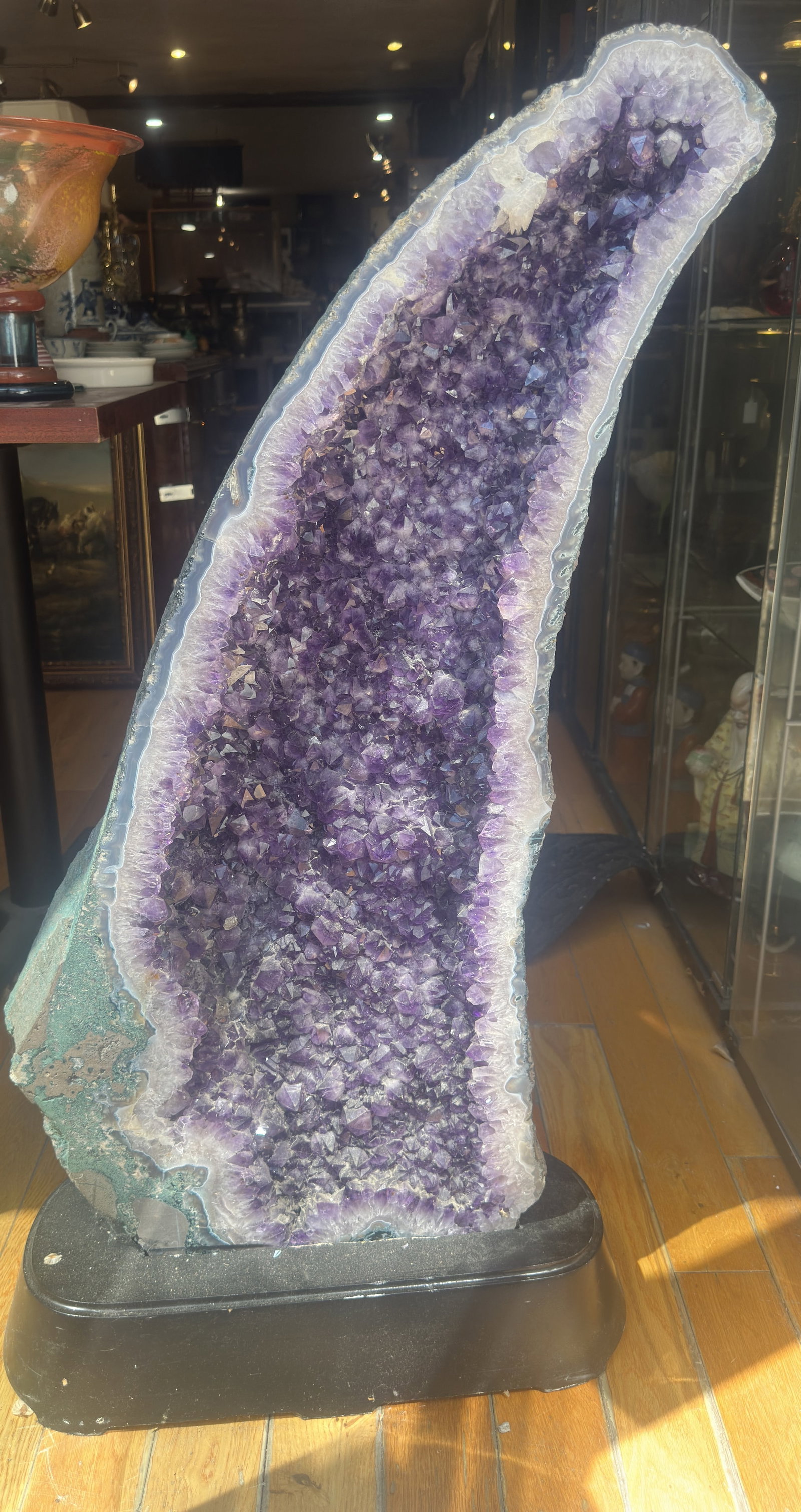 Large Amethyst Cathedral Geodes: Large Amethyst Cathedral Geodes20th Cent., BrazilImpressive tall, naturally formed amethyst cathedral geodes, featuring an elongated open cavity densely lined with deep violet quartz crystals. The int