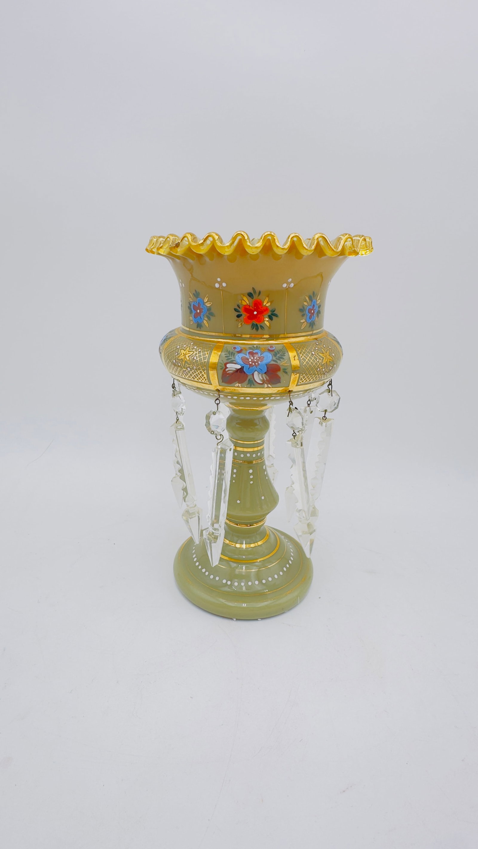 Victorian Opaline Glass Lustre Vase with Enamel & Crystal Prisms: A Victorian mint amber opaline glass lustre vase, 19th century, the lustre with a shaped font and everted mihrab point collar decorated with enamelled lappets with birds, foliage and butterflies, the 