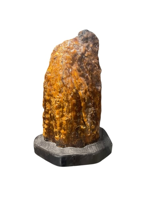 Large Natural Raw Amber Specimen with Rough Crust A large, substantial specimen of raw, unpolished: A large, substantial specimen of raw, unpolished natural amber showing a rich, organic exterior crust. Color & Texture: Features a deep amber-brown