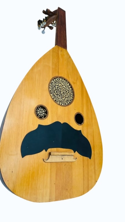 Middle Eastern Oud String Instrument A Middle Eastern oud, a traditional pear-shaped string (1 of 7)
