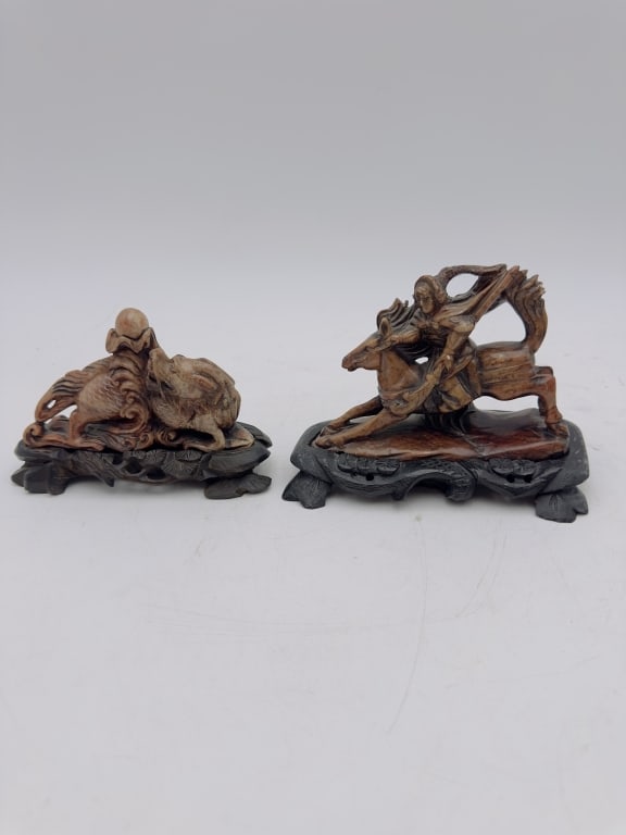 Pair of Carved Soapstone Figural Sculptures on Fis A matched pair of finely carved Asian soapstone (1 of 5)