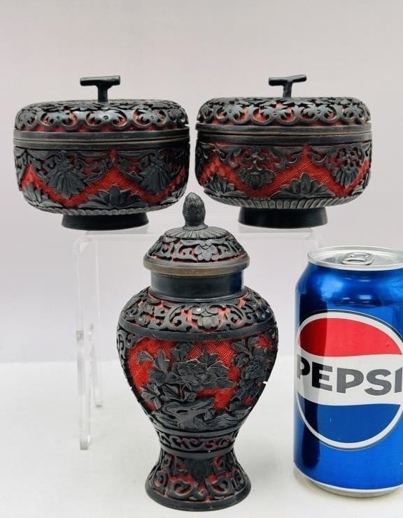 Set of Three Chinese Cinnabar Lacquer Covered Cons A decorative group of three cinnabar-lacquer (1 of 5)