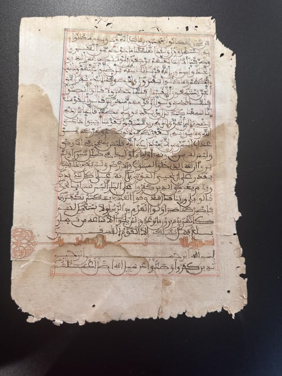 A LEAF FROM A MAGHRIBI koufi koran manuscript Qur?anic Manuscript Leaf in Maghribi ScriptRegion:: A LEAF