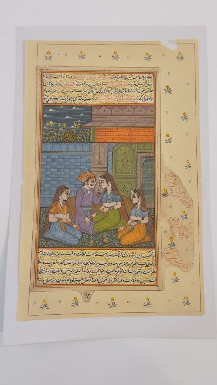 Persian or Mughal Miniature Painting Leaf with Iny An authentic antique manuscript leaf featuring a: An authentic antique manuscript leaf featuring a finely detailed hand-painted interior miniature scene framed by upper and lower cartouches of Persian script.Design & Narrative: Depicts a noble