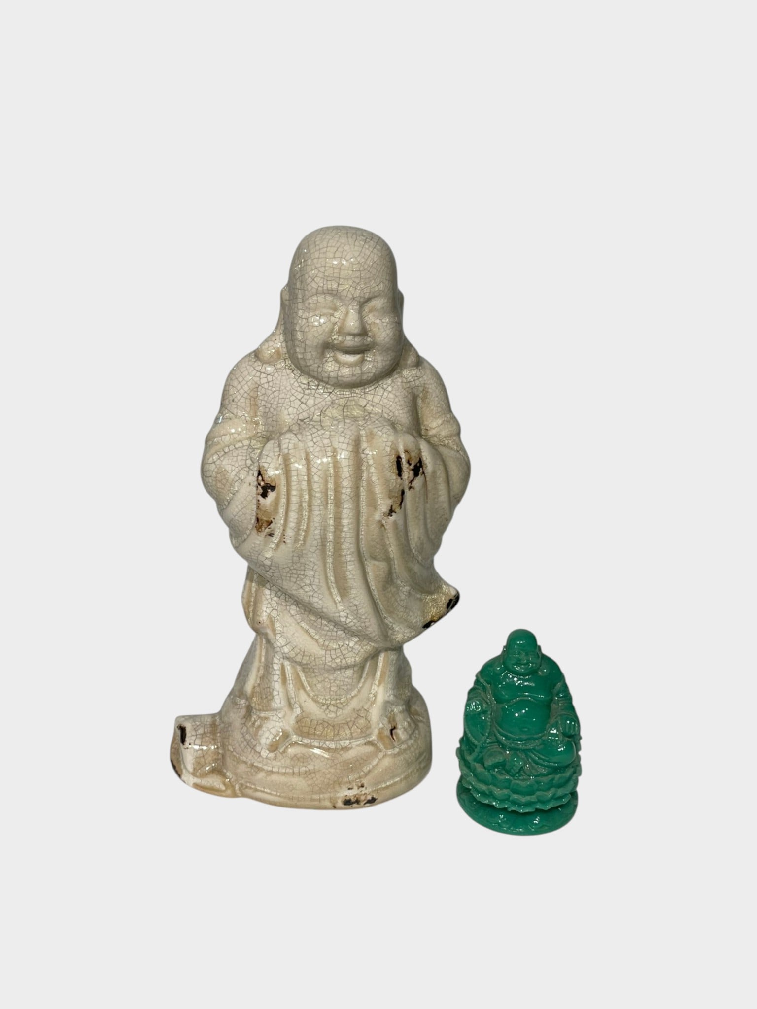TWO CHINESE GLAZED PORCELAIN BUDDHA FIGURES Two Chinese glazed porcelain Buddhist figures comprising (1 of 3)