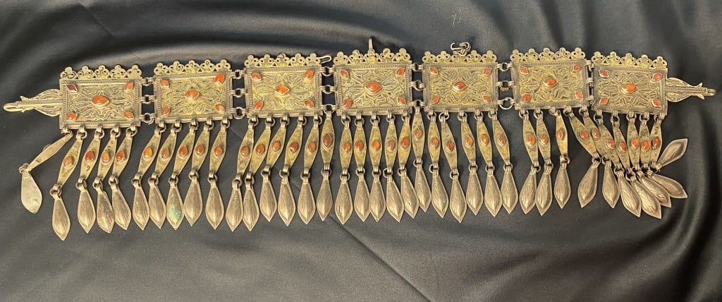 Magnificent Turkmen bonnet jewelry Magnificent Turkmen bonnet jewelry Late of the 19th century,: Magnificent Turkmen bonnet jewelry Late of the 19th century, partly silver / carnelian, 7 rectangular plates with filigree decoration, gold inlaid and eye-shaped carnelian trimmings, each crowned with