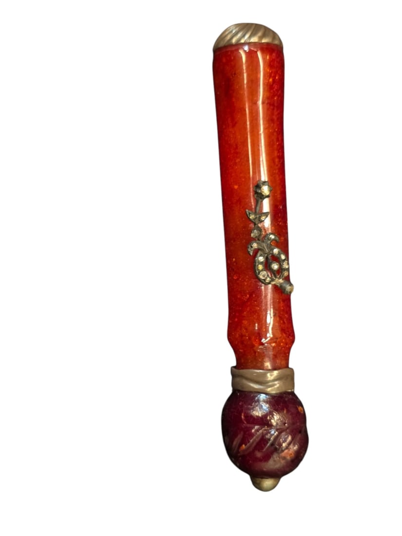 Antique Ottoman Amber Mouthpiece: An antique Ottoman smoking accessory, specifically a replacement or detachable mouthpiece (imambakshi) for a traditional chibouk long pipe.Design & Motifs: Comprises a vibrant, translucent red-orange 
