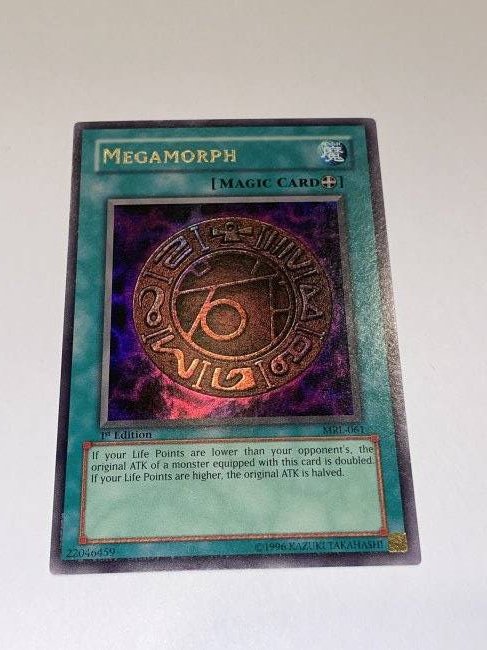 Yu-Gi-Oh! Megamorph. Magic Card.: 1st Edition. ULTRA. 1996 Kazuki Takahashi.