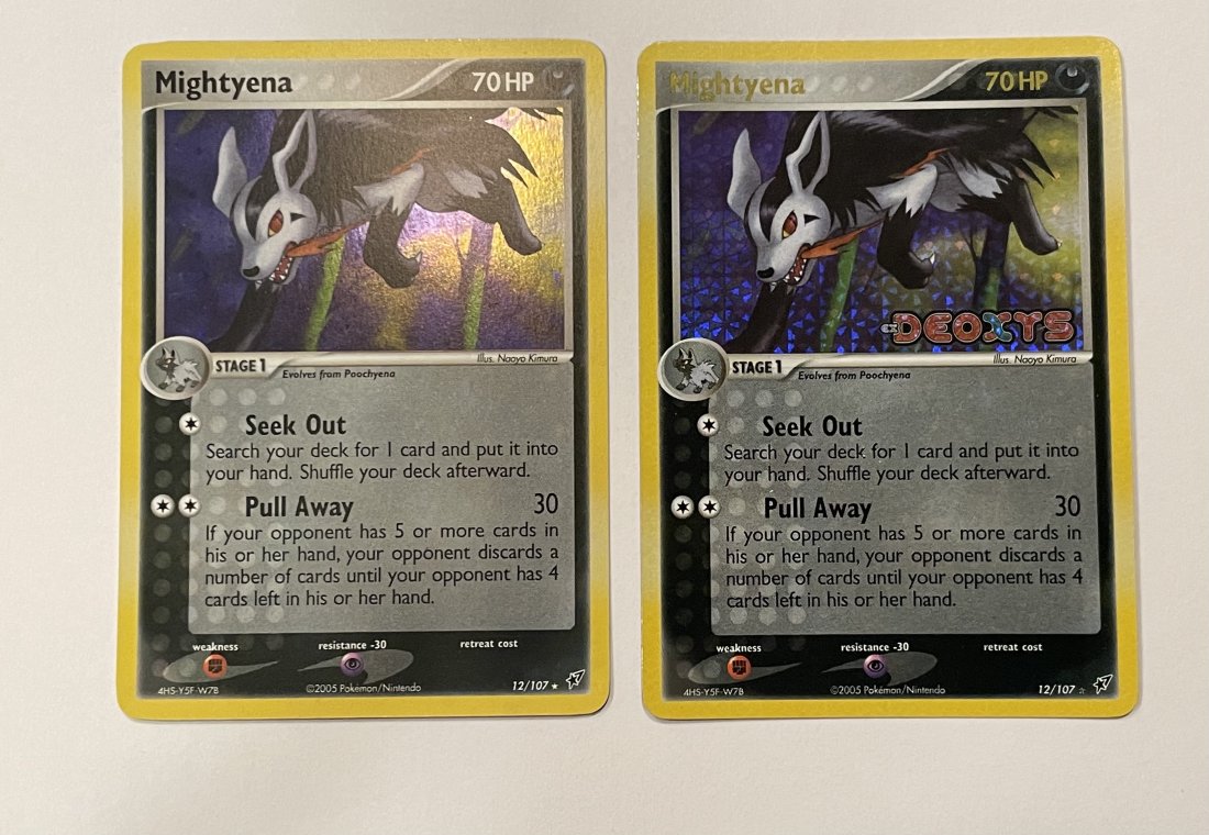 TWO Mightyena Holo 12/107 Pokémon Cards, One EX DEOXYS: 2005 Pokémon / Nintendo. 70 HP. Comes with sleeve. Great condition!