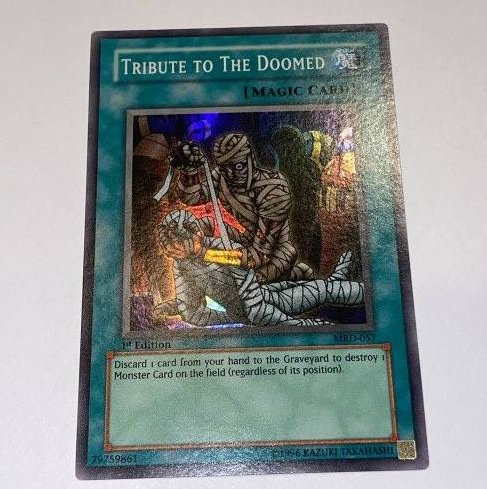 Yu-Gi-Oh! Tribute To The Doomed. 1st Editon.: Super Card. If PSA Graded 10 it can retail for $300. 1996 Kazuki Takahashi. MRD-097. Great Conditon!