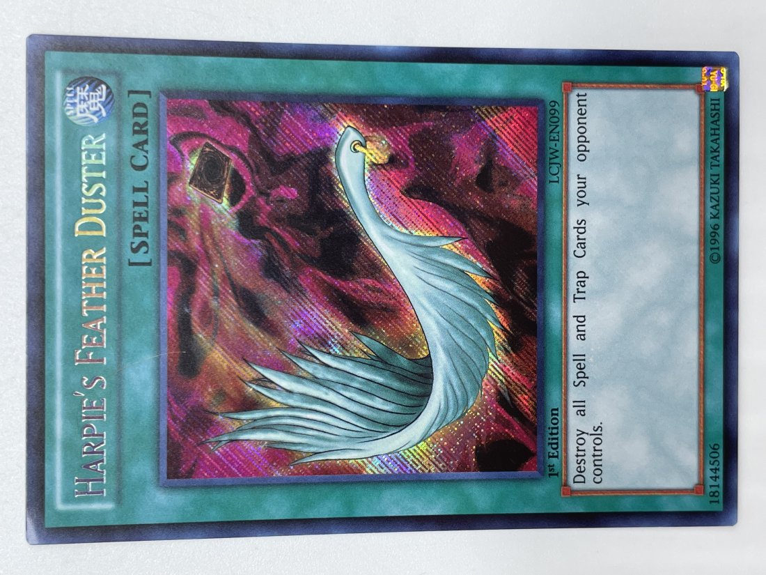 Yu-Gi-Oh! Harpie's Fetaher Duster. Spell Card.: 1st Edition, SECRET Card. Good Condition. 1996 Kazuki Takahashi.