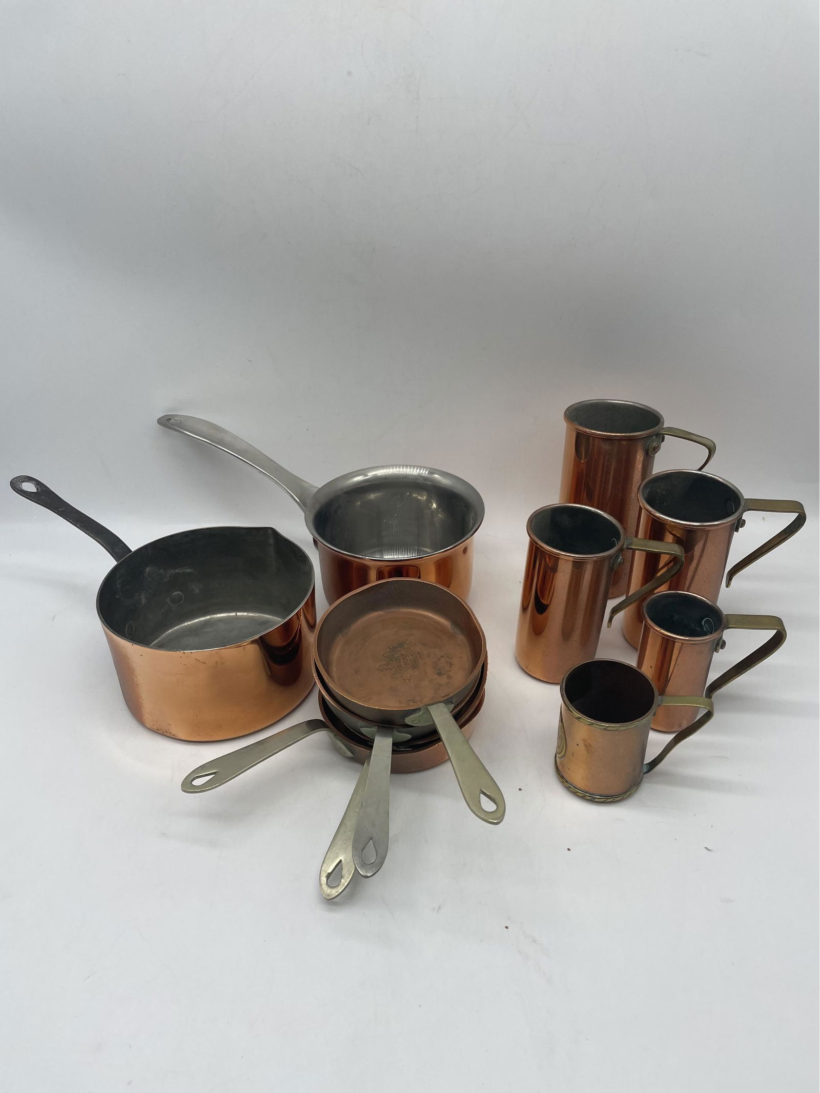 Copper Measuring Cups And Miniature Pans (1 of 4)