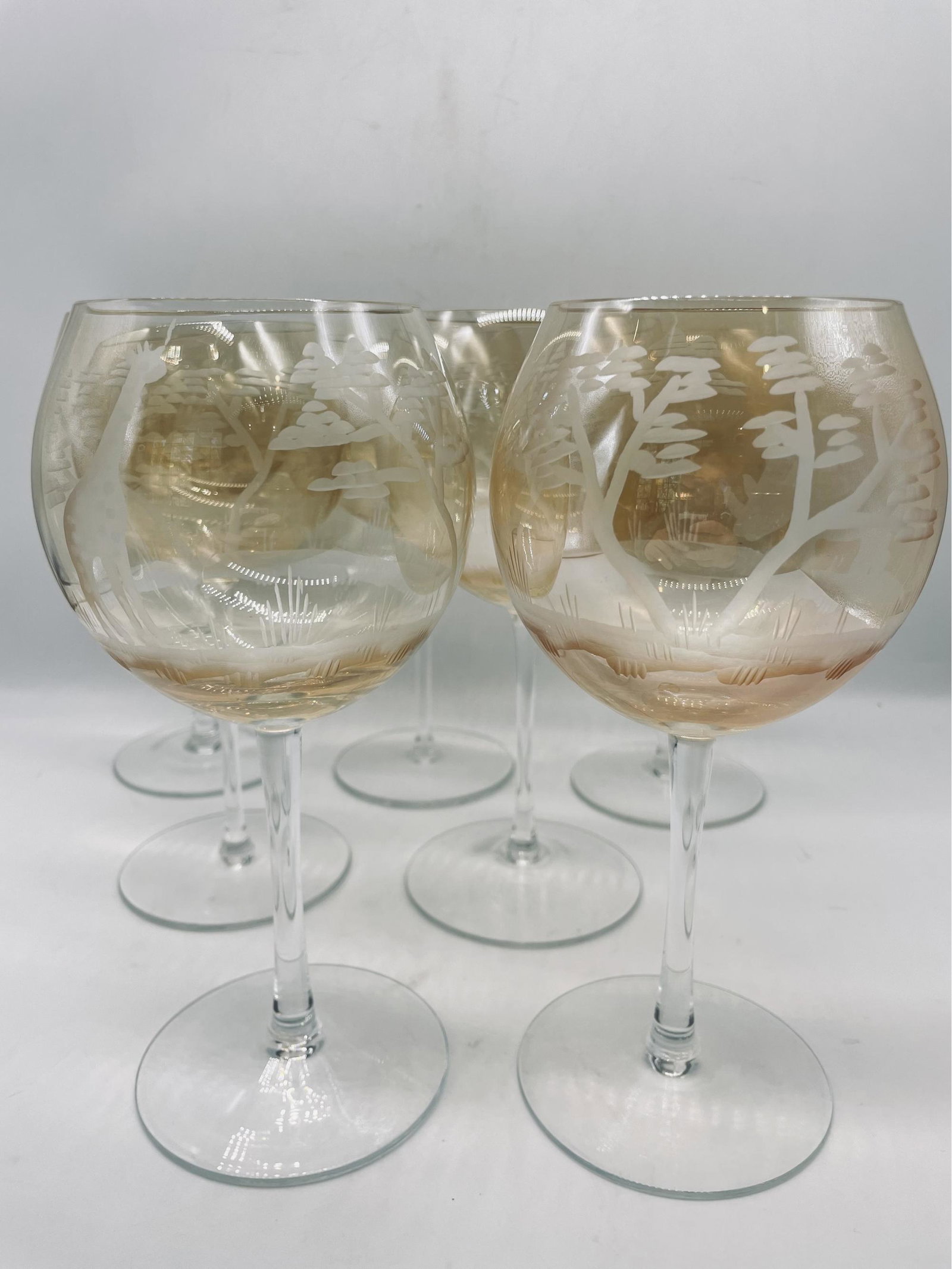 Amber Glass Etched Wine Glasses. Giraffe/jungle Details: 7 glasses