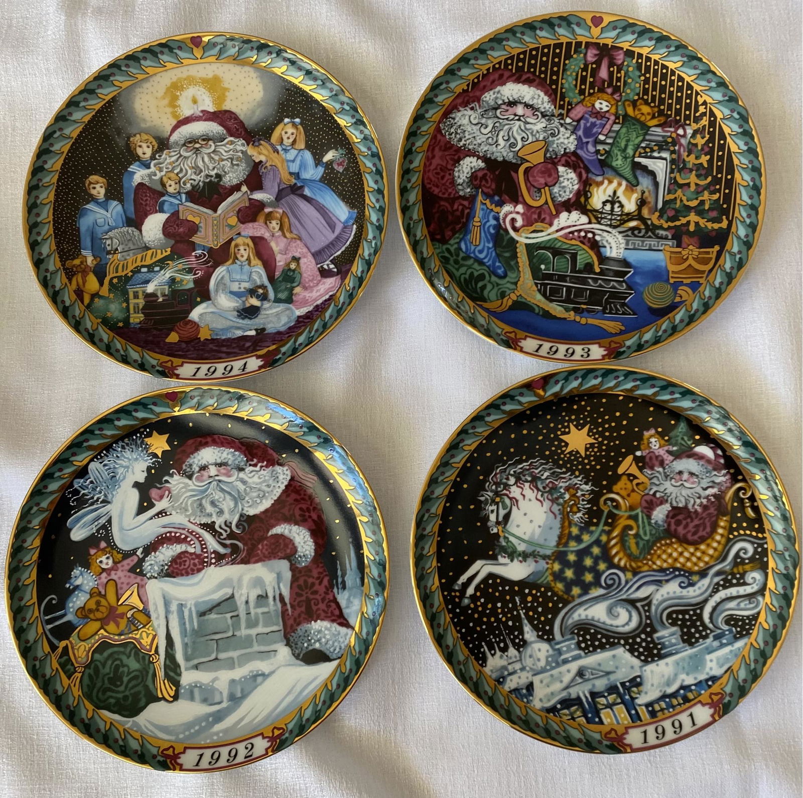 (4) Commemorative Christmas Plates With Art By Hans Henrik Hansen, Years 1991-94: (4) Commemorative Christmas Plates With Art By Hans Henrik Hansen, Years 1991-94