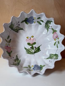 This piece is a Portuguese Faience (tin-glazed earthenware) Footed Bowl