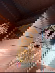 Rustic Thatched-Roof Birdhouse