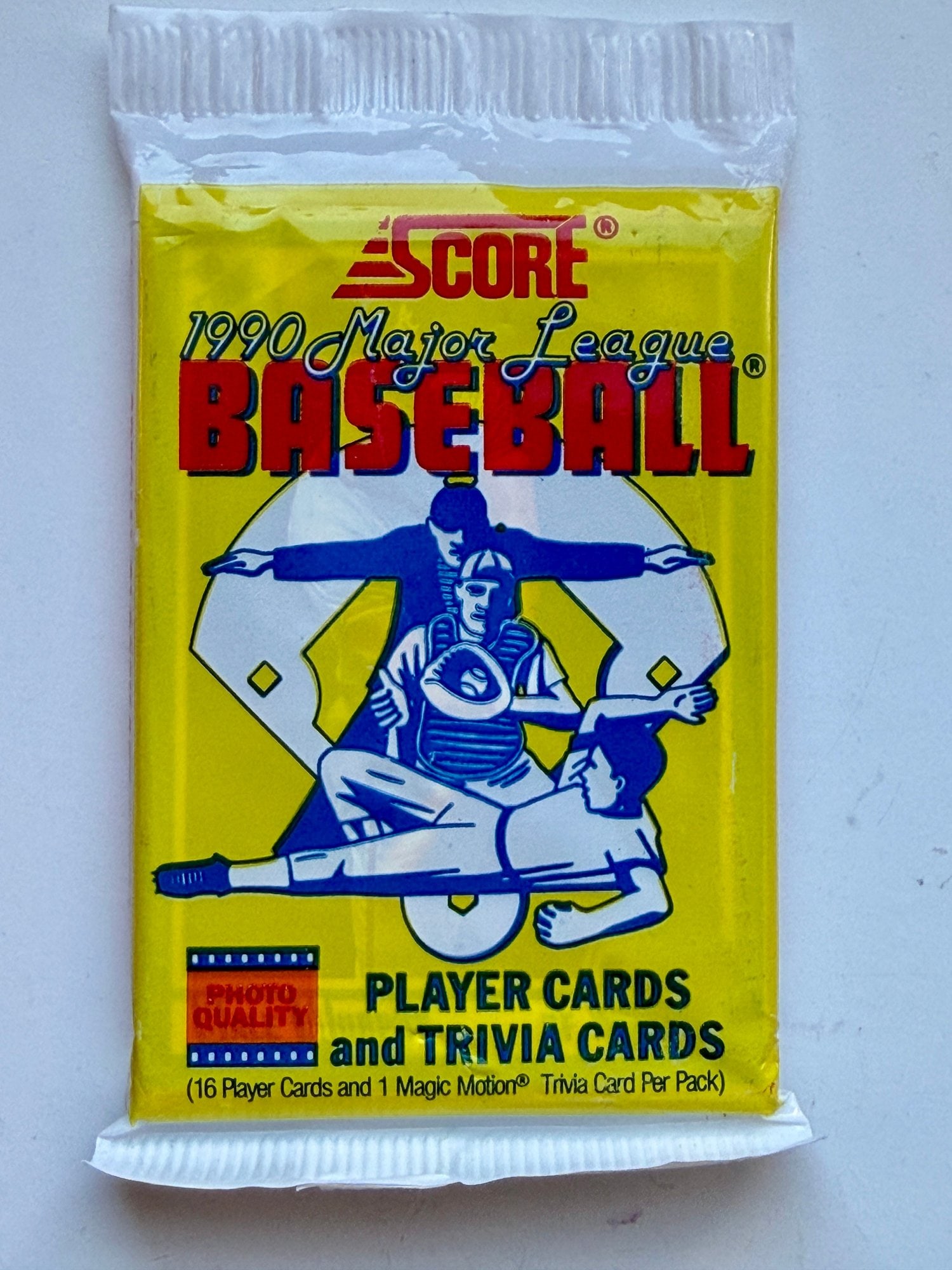 1990 Score Major League Baseball Unopened Wax Pack: Step back into the "Junk Wax" era with this vintage unopened pack of 1990 Score Baseball. This series is famous for its vibrant, colorful borders and a checklist that includes legends like Nolan Ryan,