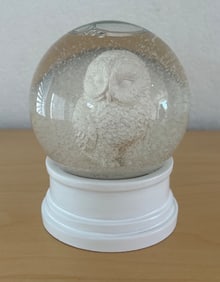 Glass Snow Globe With White Owl Figurine on White Base