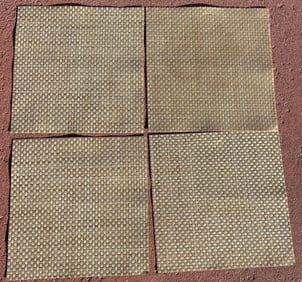 Four Woven Straw Placemats with Neutral Color Design