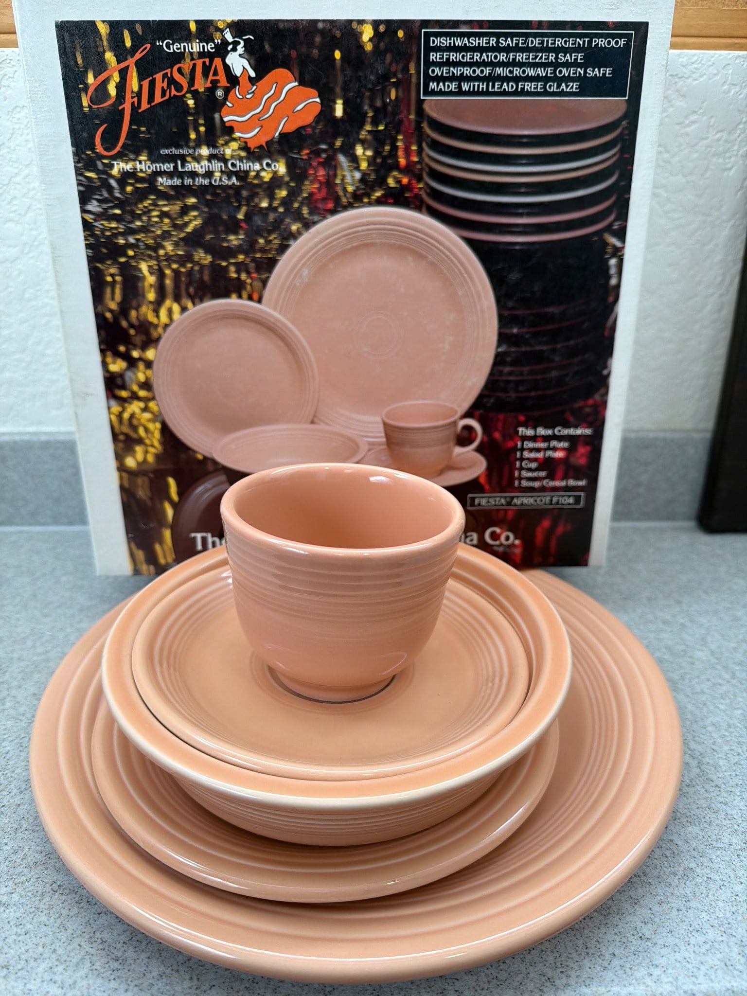 Vintage Genuine Fiesta Apricot Dinnerware Set, 5 Pieces: Vintage Fiesta dinnerware set in the Apricot color (F104) by The Homer Laughlin China Co. This 5-piece set includes 1 dinner plate, 1 salad plate, 1 cup, 1 saucer, and 1 soup/cereal bowl. The dinnerwa