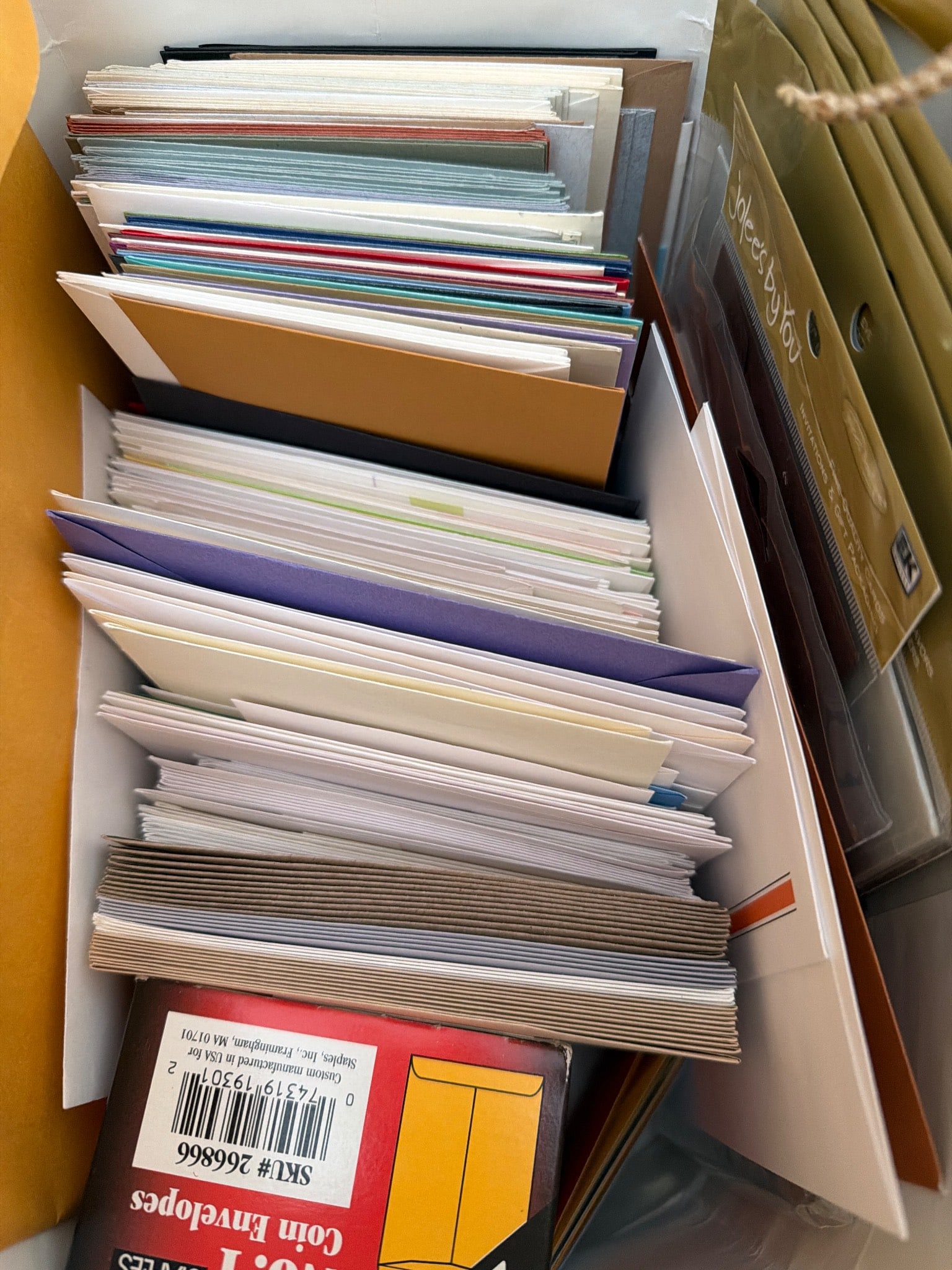 Envelopes and Hallmark Holiday Cards: Envelopes and cards, including a box of 100 white envelopes (9.2 cm x 16.5 cm) by Officeworks and a pack of Hallmark holiday cards featuring fox designs with 20 cards and envelopes. Additional items i