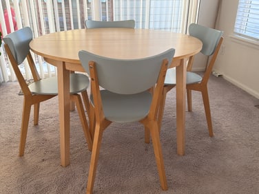 Round Wooden Dining Table with Four Matching Chairs