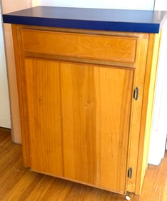 Wood Cabinet with Blue Laminate Top and Interior Shelving