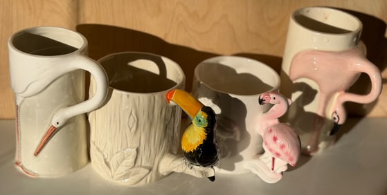 Five Ceramic Wildlife-Themed Mugs with Bird Details