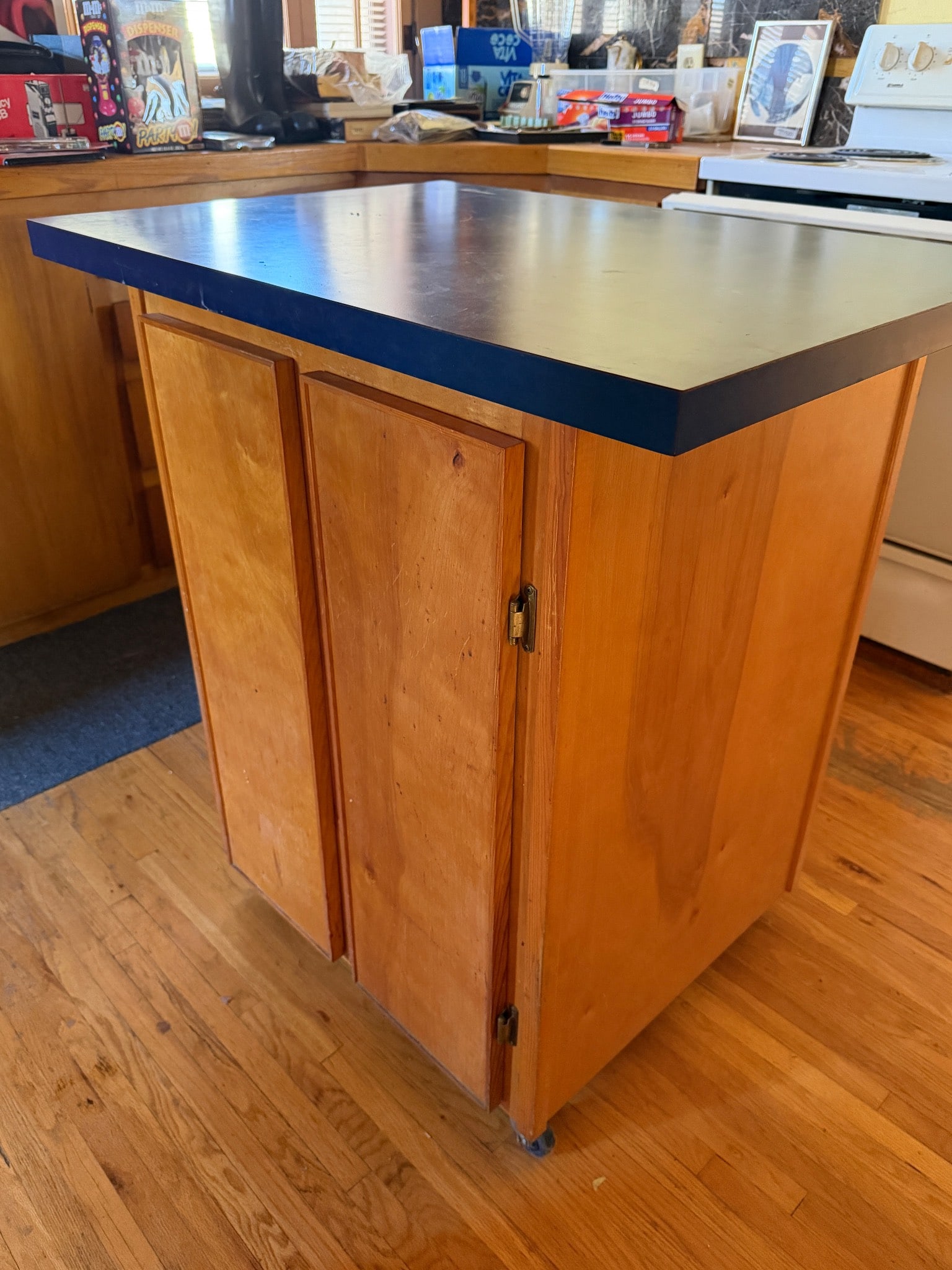 Wooden Kitchen Island with Blue Top and Casters (1 of 6)