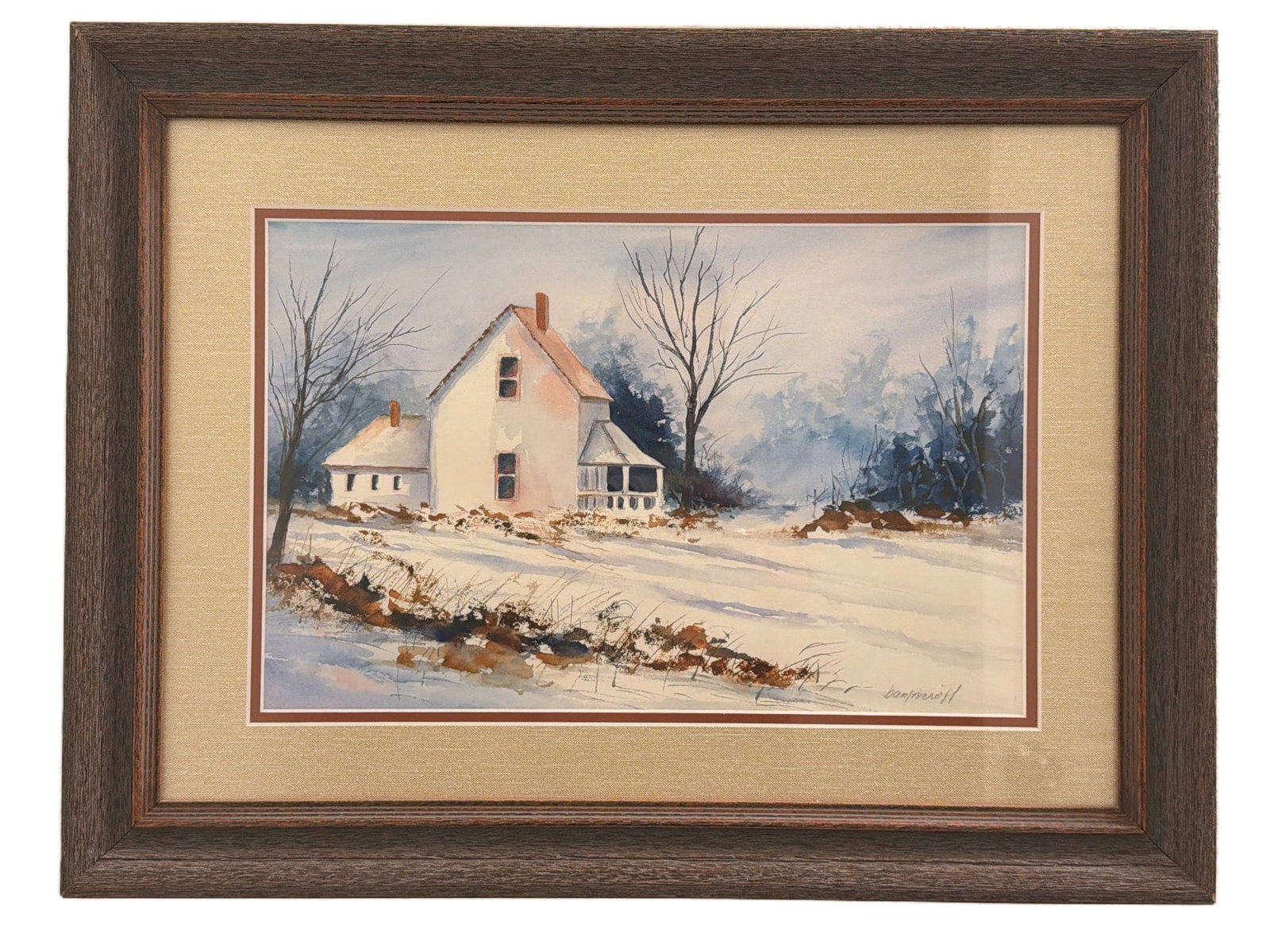 Framed Watercolor Painting of a Snowy Rural Scene by Signed Artist: Framed watercolor painting depicting a snowy rural landscape with a white house, two trees, and a winter backdrop. The artwork is signed by the artist, but the signature is difficult to decipher. Prof