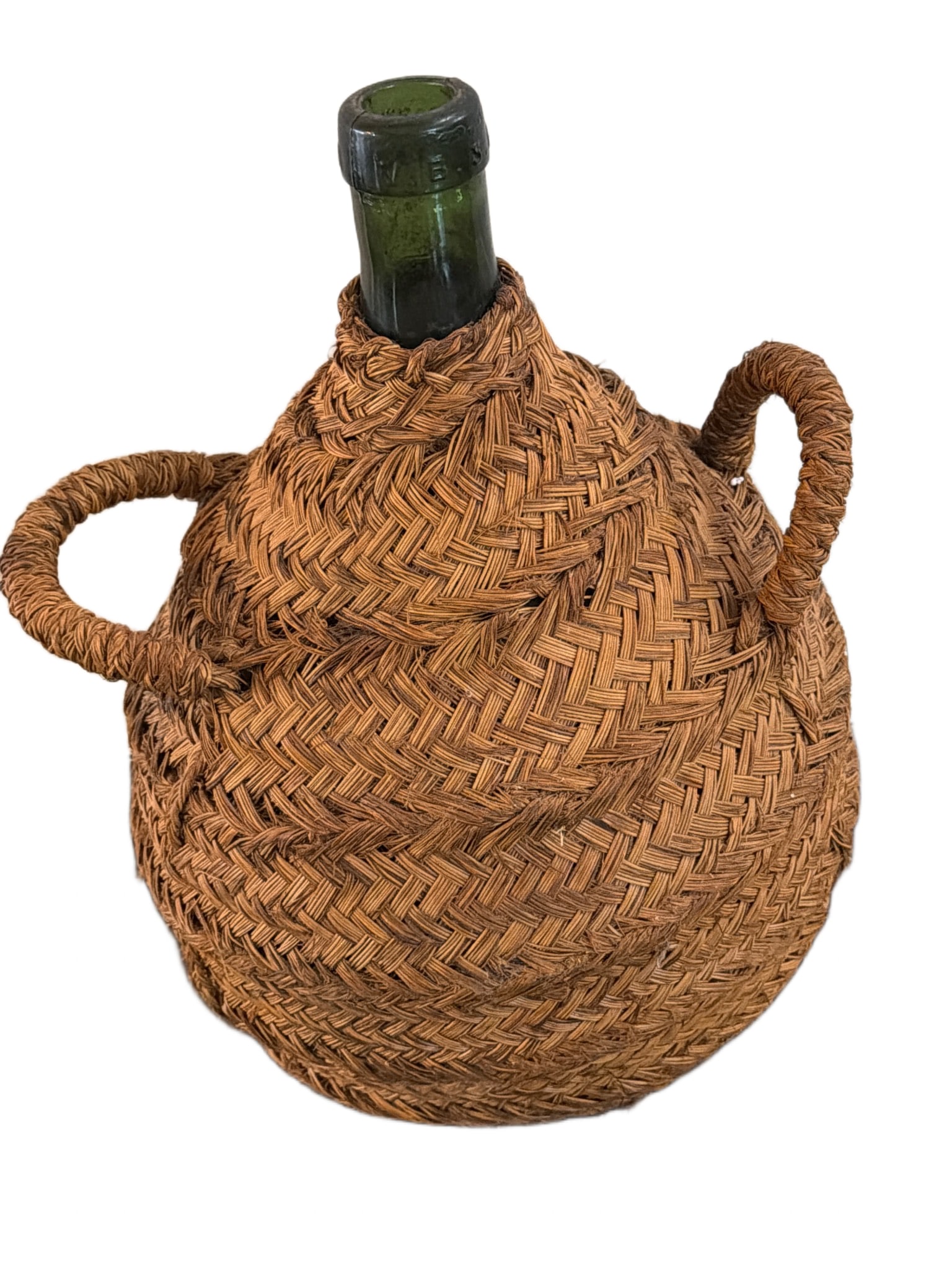 Antique Large Glass Wine Bottle with Woven Straw Covering and Two Handles: A large green glass wine bottle encased in a woven straw covering with two side handles. The straw features a detailed braided pattern, providing added durability and a rustic aesthetic. The bottle op