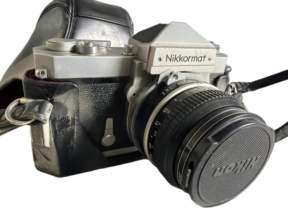 Nikkormat EL 35mm SLR Film Camera with Vivitar 52mm UV-Haze Lens and Leather Case (1 of 3)