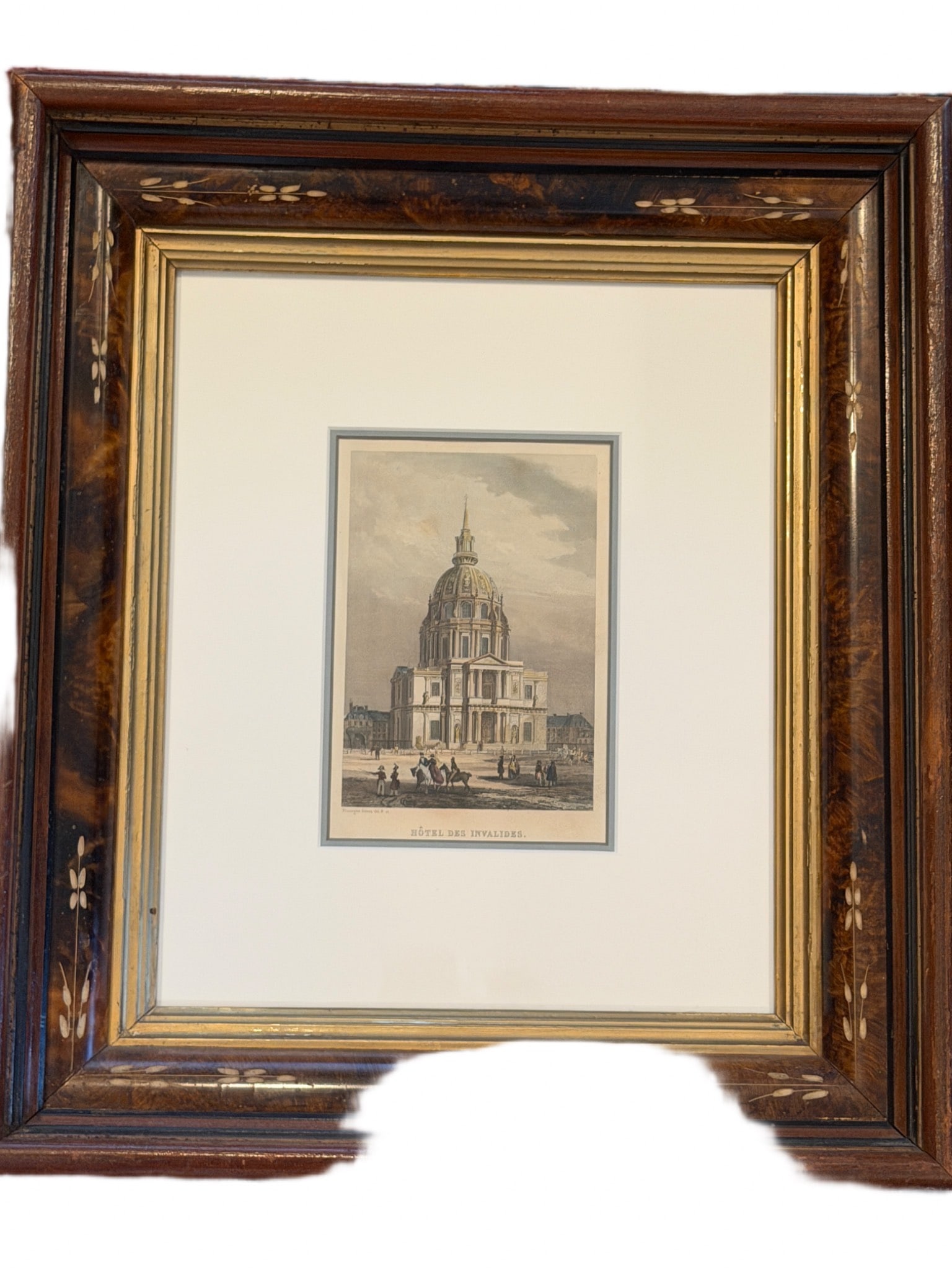Framed Engraving of Hotel des Invalides by Rouargue Freres: A framed engraving of Hotel des Invalides, created by Rouargue Freres. The artwork is housed in a decorative wooden frame featuring inlaid details and a gold-toned inner border. The engraving depicts