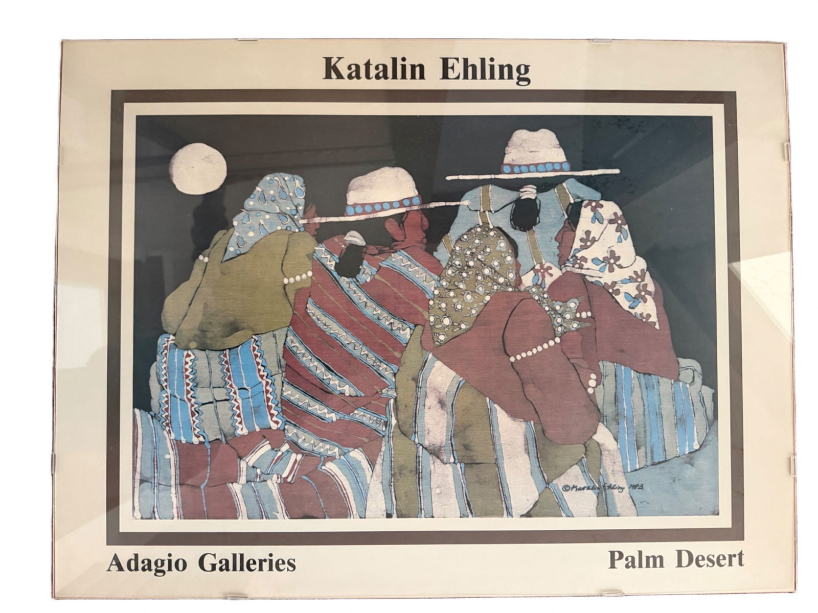 Framed Poster of ‘Kachin Dining’ by Agayo Galleries, 1974: Framed poster titled 'Kachin Dining' by Agayo Galleries, featuring artistic depictions of multiple figures dressed in vibrant, patterned attire. The artwork is signed and dated 1974. The frame is secu