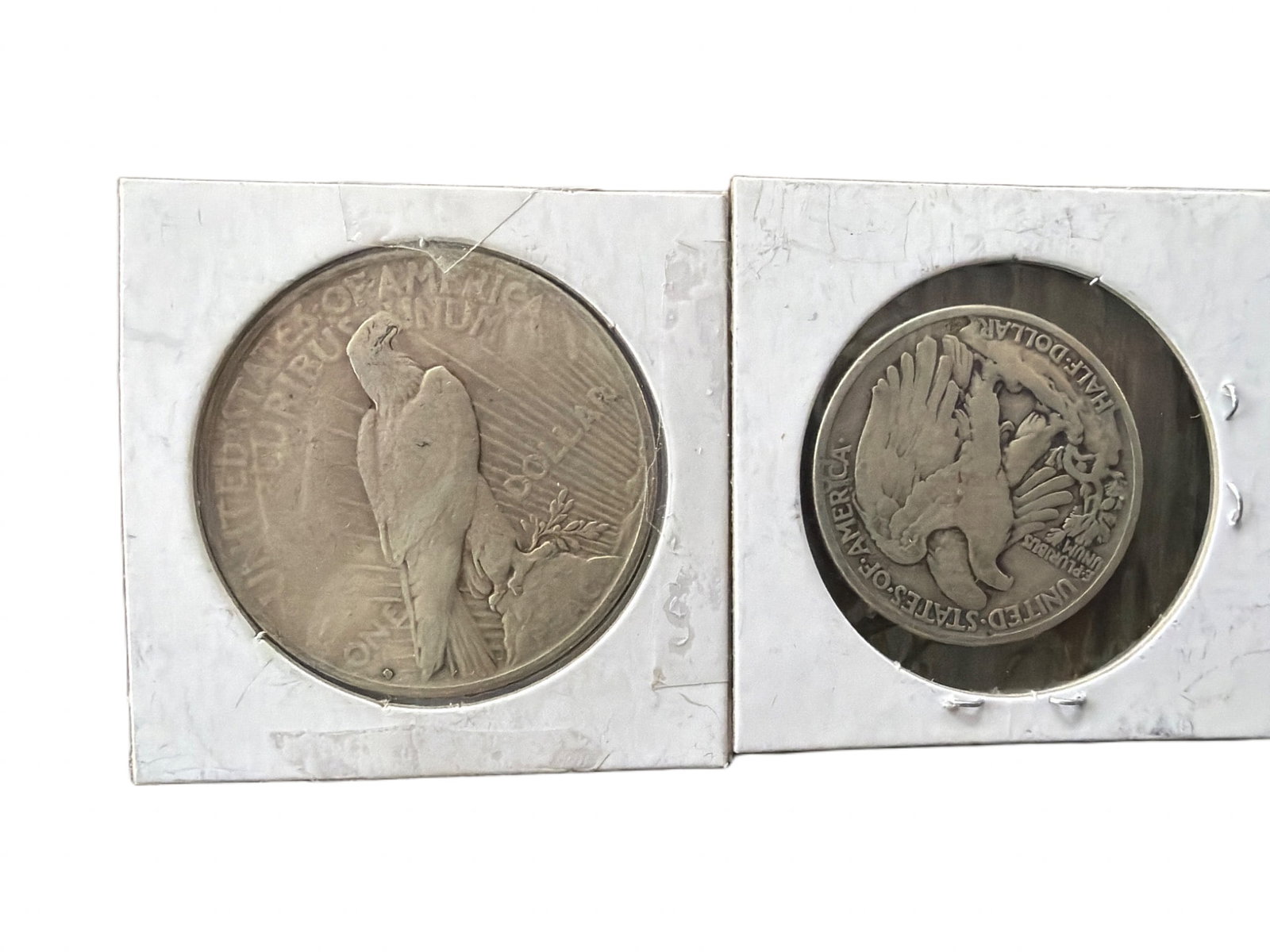 Two United States Silver Coins Including Peace Dollar and Walking Liberty Half Dollar (1 of 2)