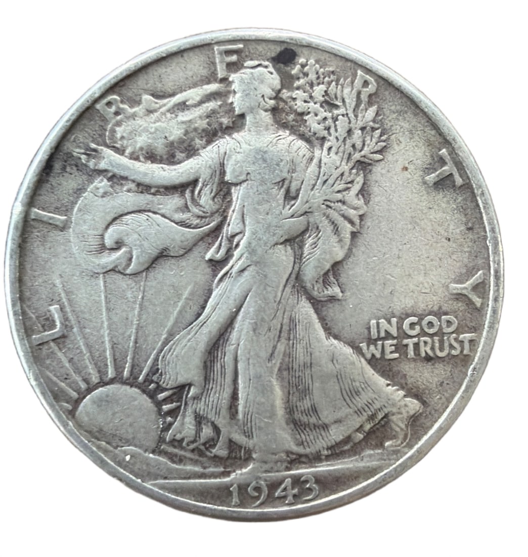 1943 United States Walking Liberty Half Dollar, 13 Grams: This item is a 1943 United States Walking Liberty Half Dollar coin. It weighs 13 grams and is composed of an alloy primarily consisting of silver. The obverse features the Walking Liberty design, whil