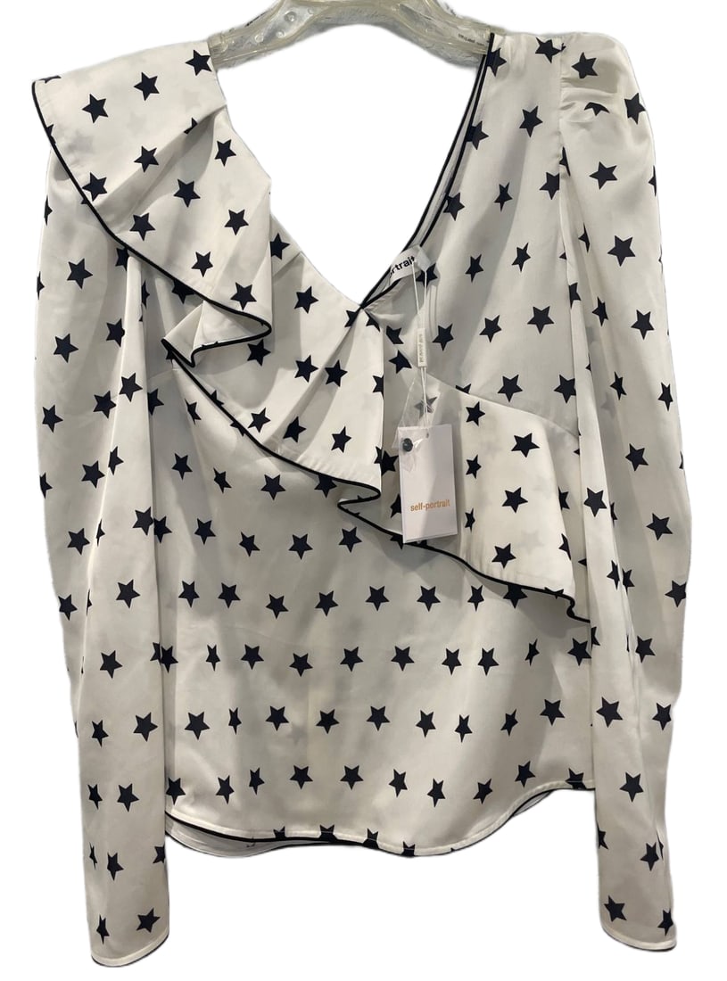 Ivory Star Print Frill Top, Size US 10: White frill top with black star print design. Features asymmetrical ruffle detailing along the front and back, a V-neckline, and long sleeves with button cuffs. Marked as size UK 14/US 10, style code 