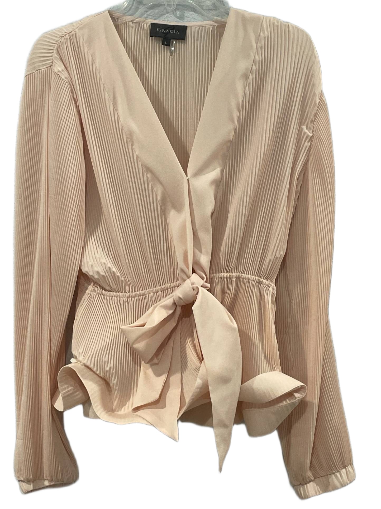Gracia Women’s Pleated Long-Sleeve Tie-Waist Blouse, Size Large: Gracia women’s blouse in a pale blush tone, featuring pleated fabric throughout. Designed with a V-neckline, long sleeves, and an adjustable tie-waist detail. Fabric composition unspecified, with la